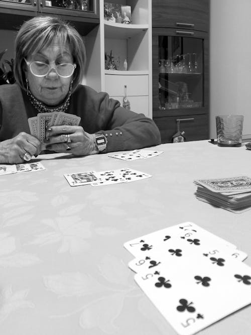 Free stock photo of game, old woman, poker cards