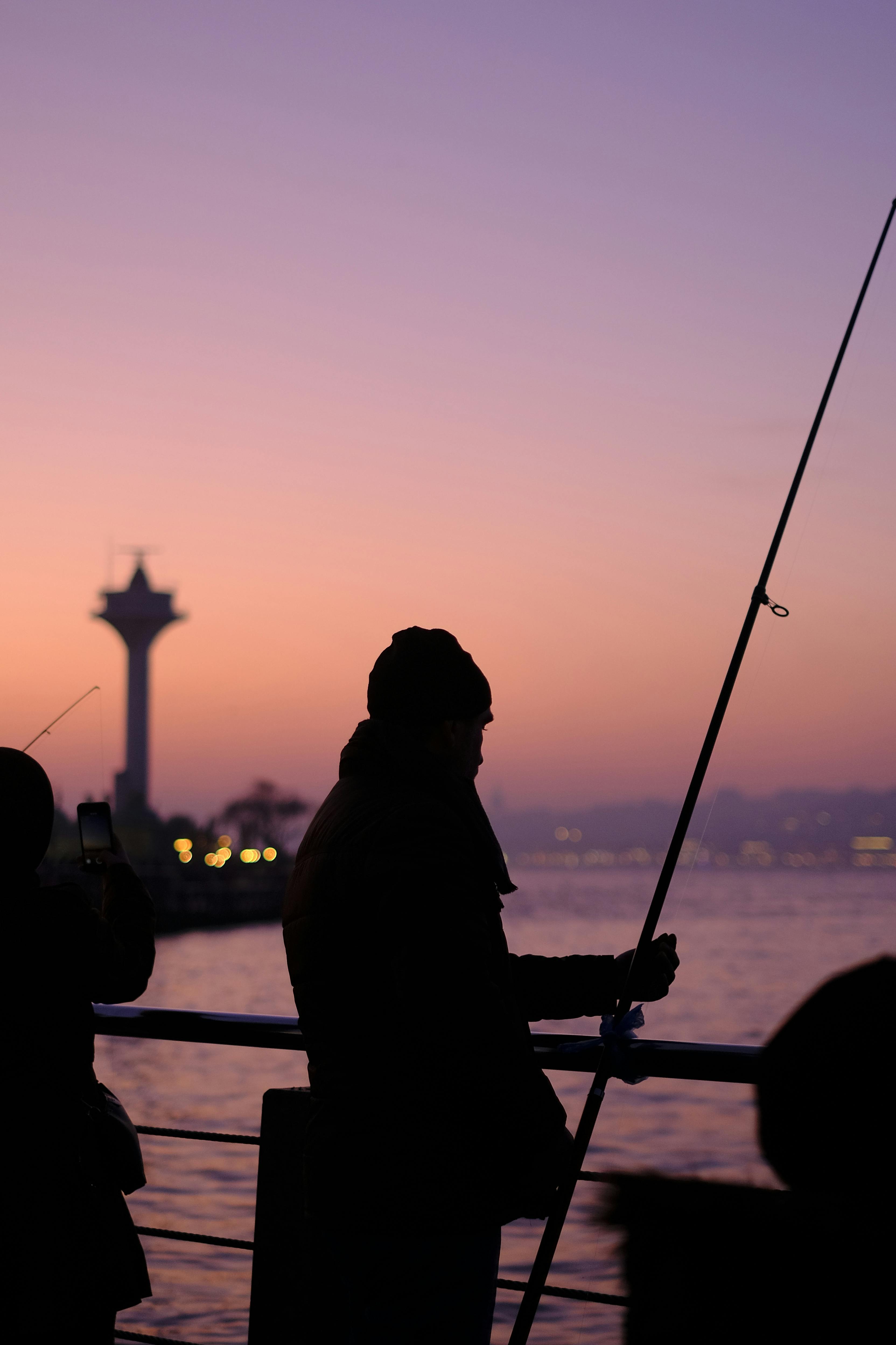 Men Fishing From the Pier · Free Stock Photo