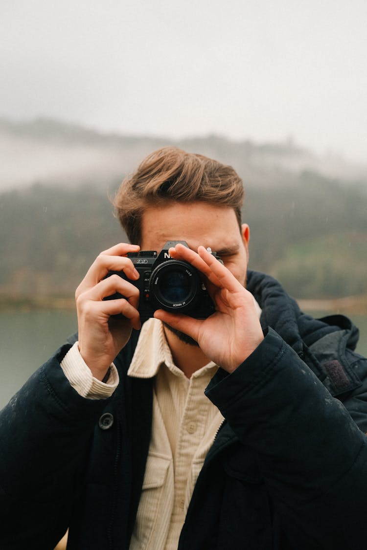 Man Photographer In Mountains