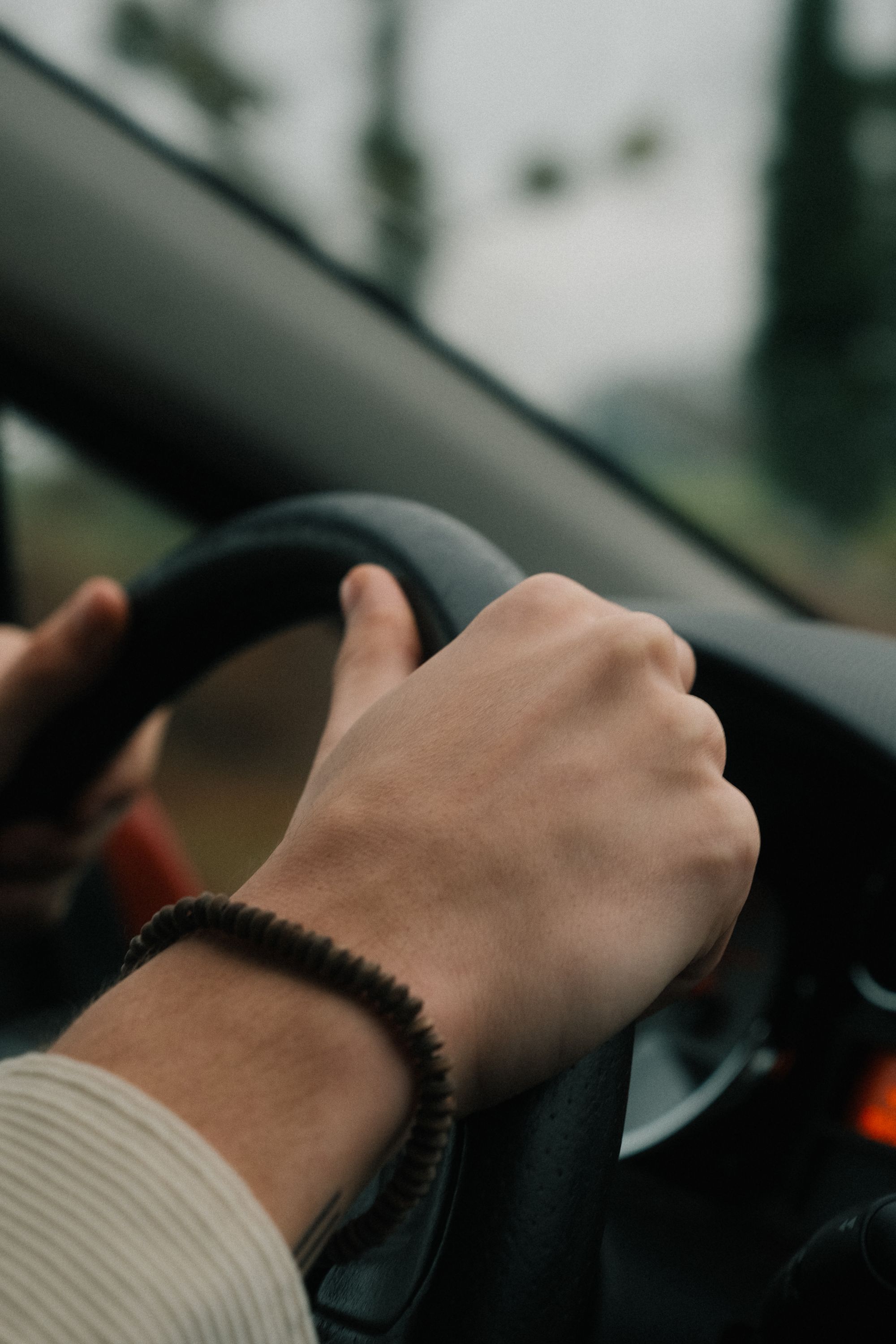 A driver gripping a steering wheel is the most relevant image to an article about everyday driving needs and horsepower.