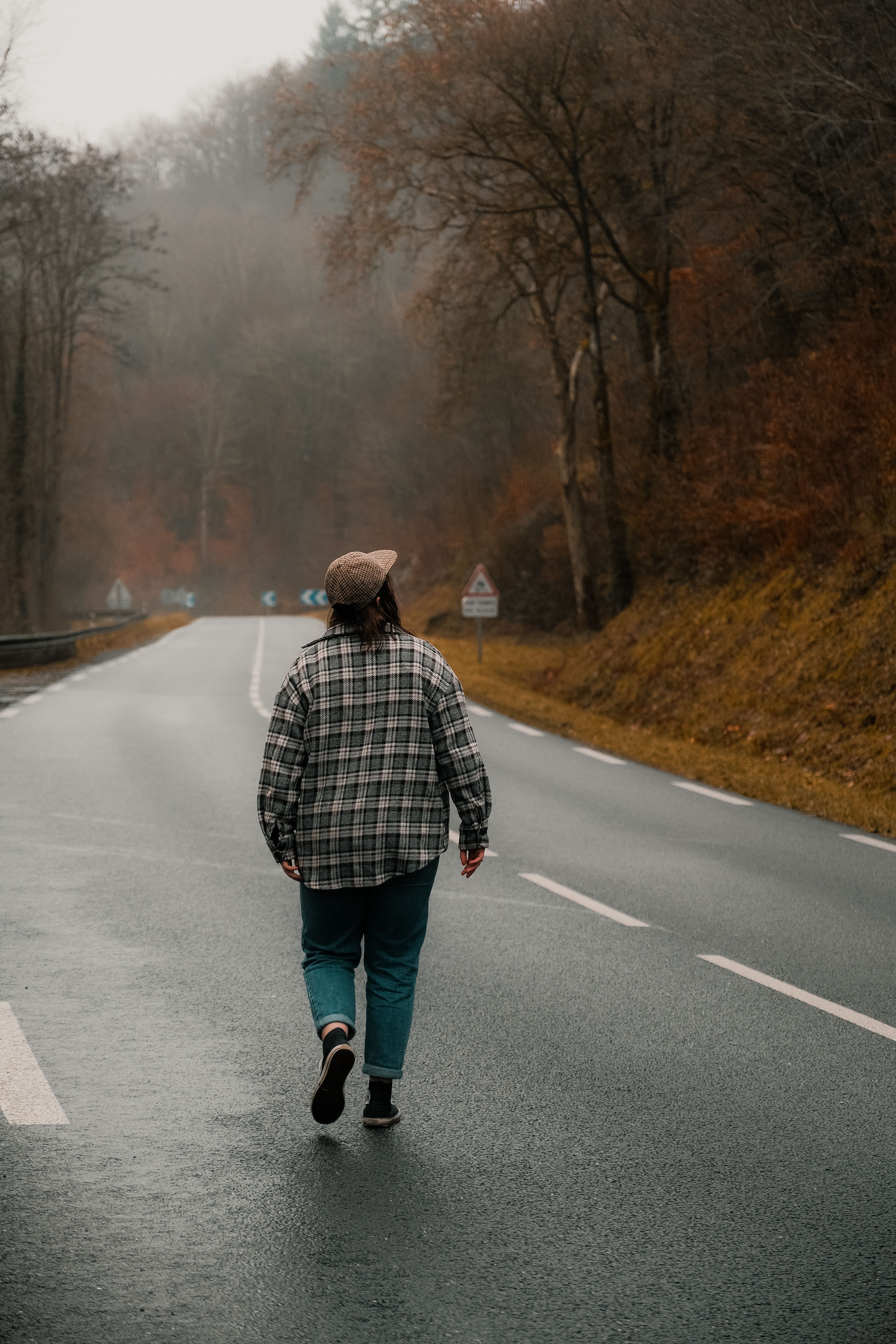 Woman Walking along Road in Autumn · Free Stock Photo