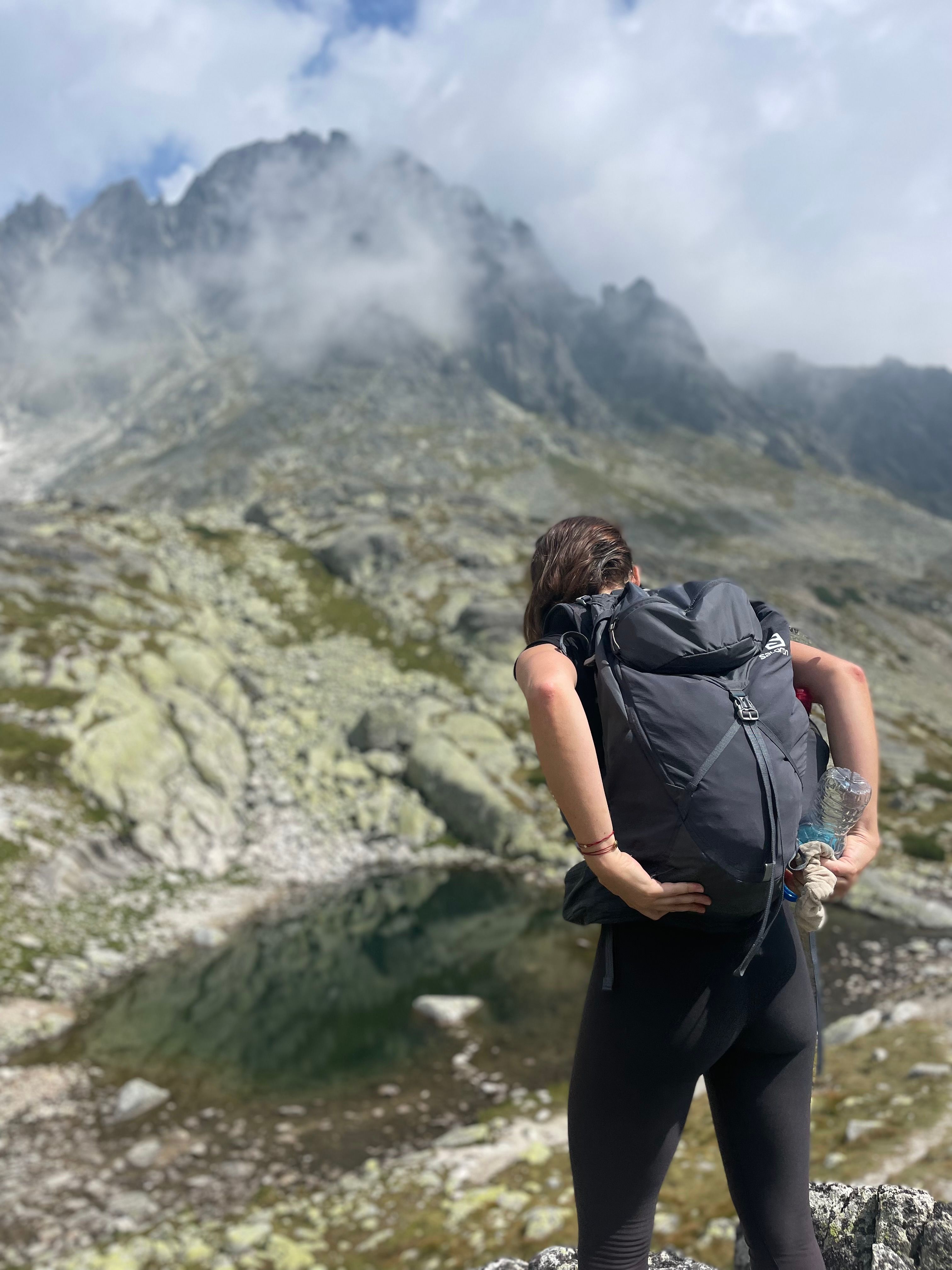 Woman Hiking in Mountains · Free Stock Photo