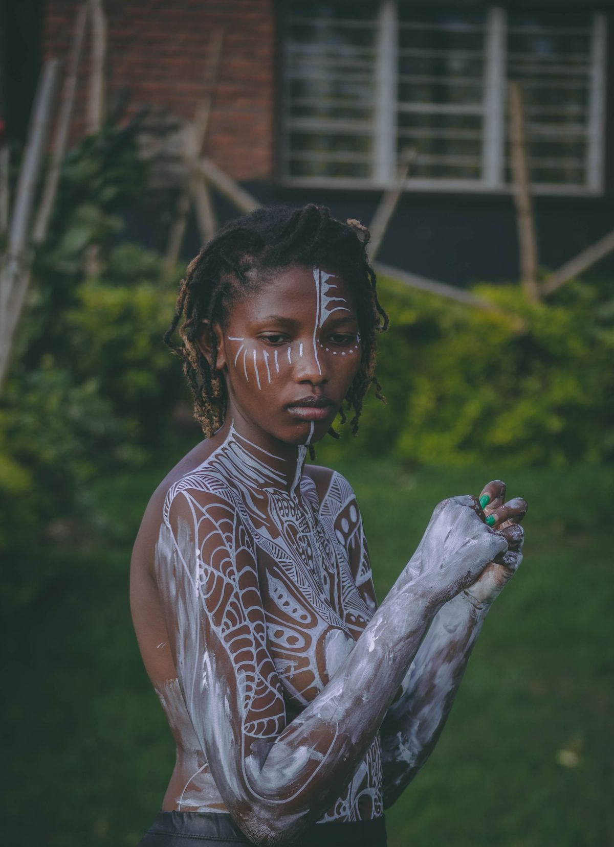 African Woman with Traditional Body Art in Nature · Free Stock Photo