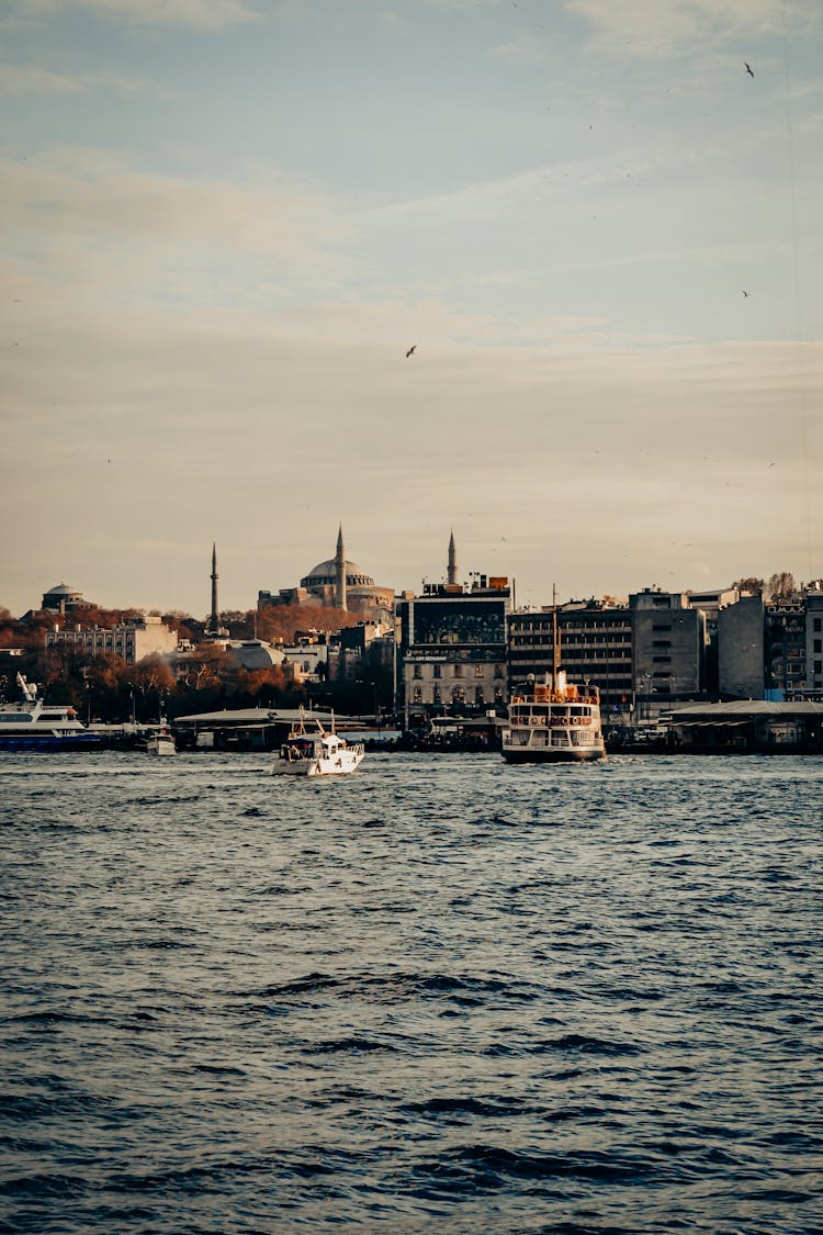 Ferryboats Sailing On The River