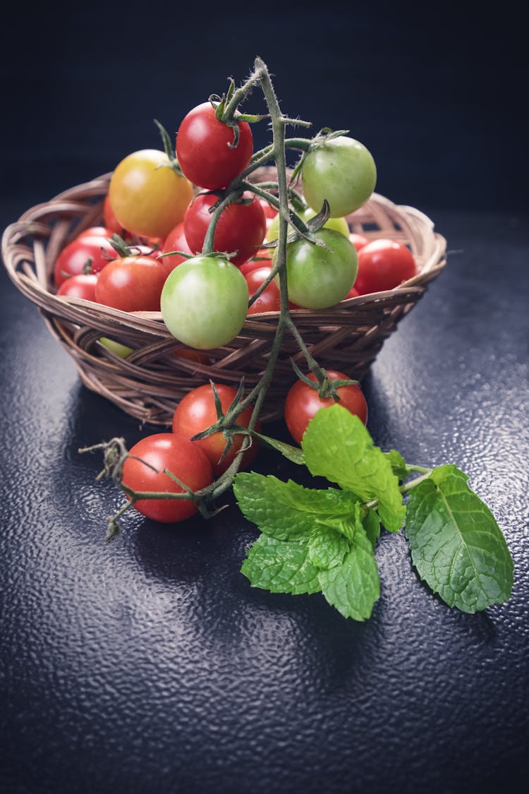 Photo Of Tomatoes On Woven Basket