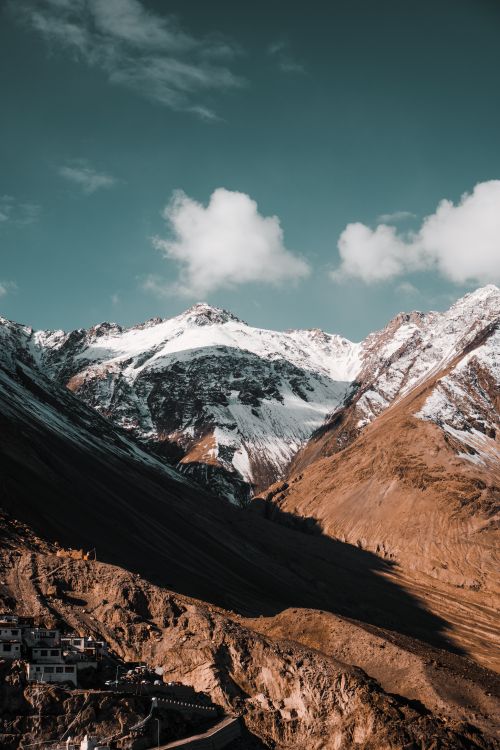 Free Majestic snowcapped peaks in Ladakh under a clear blue sky, a perfect scenic landscape. Stock Photo