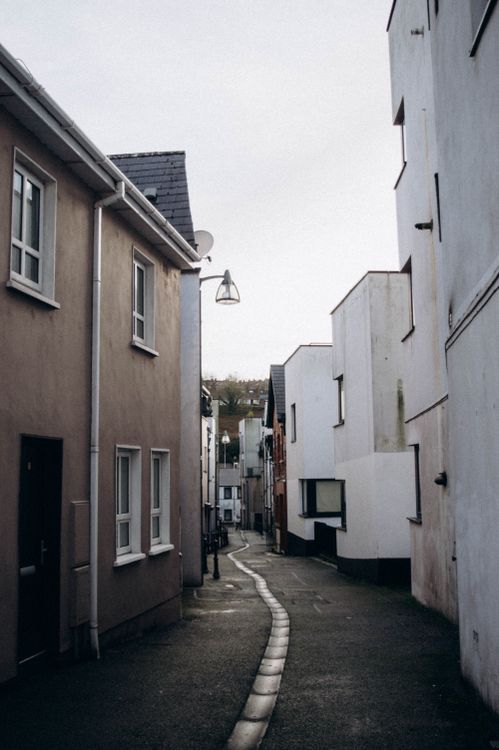 Narrow Imagegery An Alley between Residential Buildings in City · Free Stock Photo