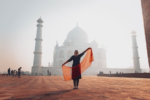 Woman with Scarf in Front of Taj Mahal