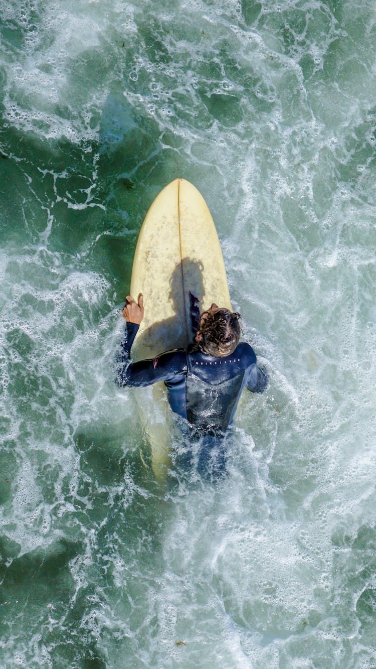 Surfer On Sea Waves