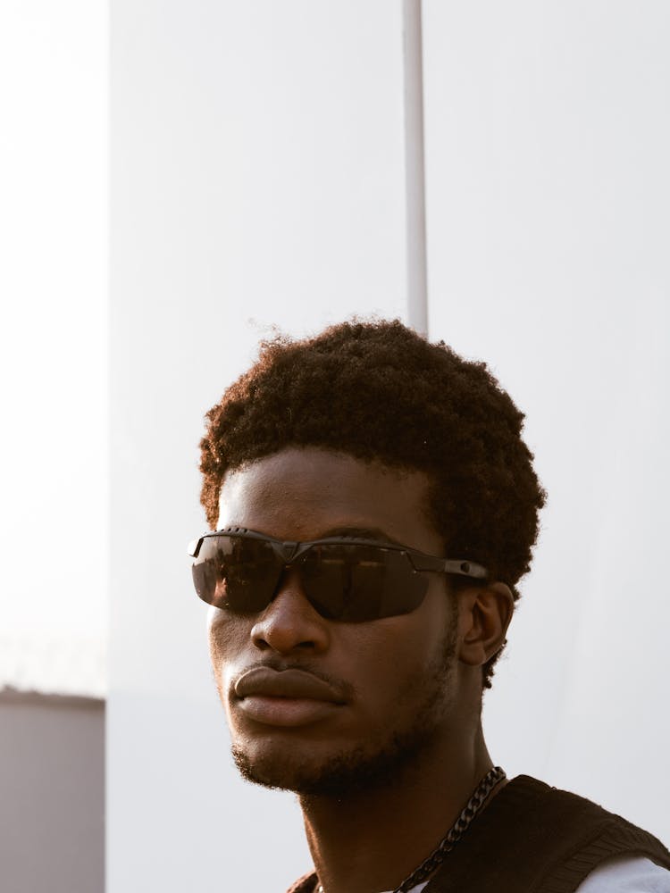 Close-Up Shot Of A Man Wearing Sunglasses