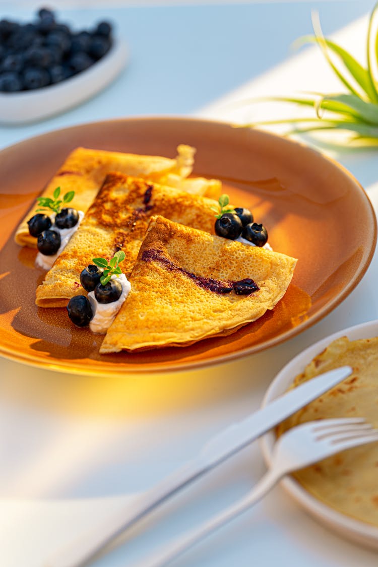 Pancakes With Fruits On Plate