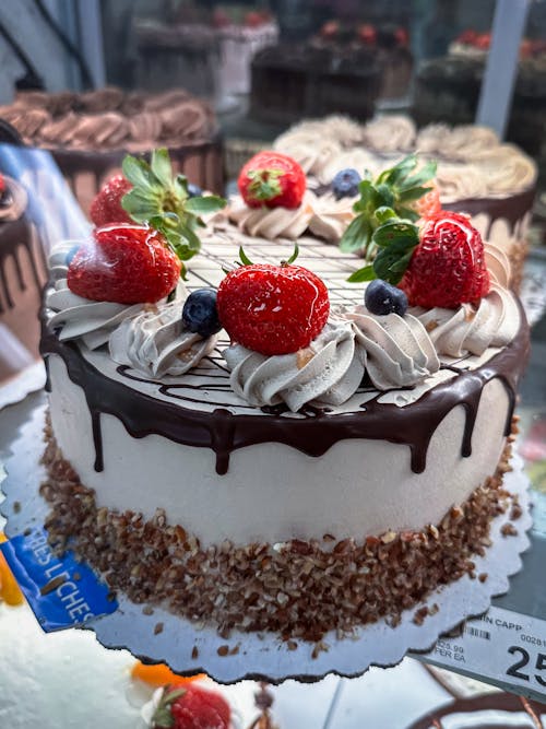 Free Chocolate Cake with Fruits on Top Stock Photo