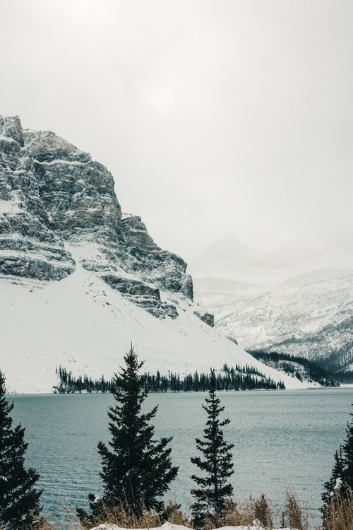 Free Stunning winter landscape of snow-covered mountains in Jasper, AB, Canada. Stock Photo