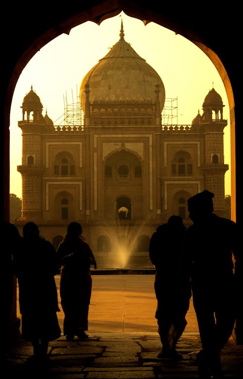 Silhouette of People Against the Safdarjung Tomb in New Delhi