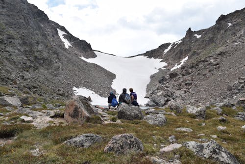 Free Three People Facing Snowfield Stock Photo