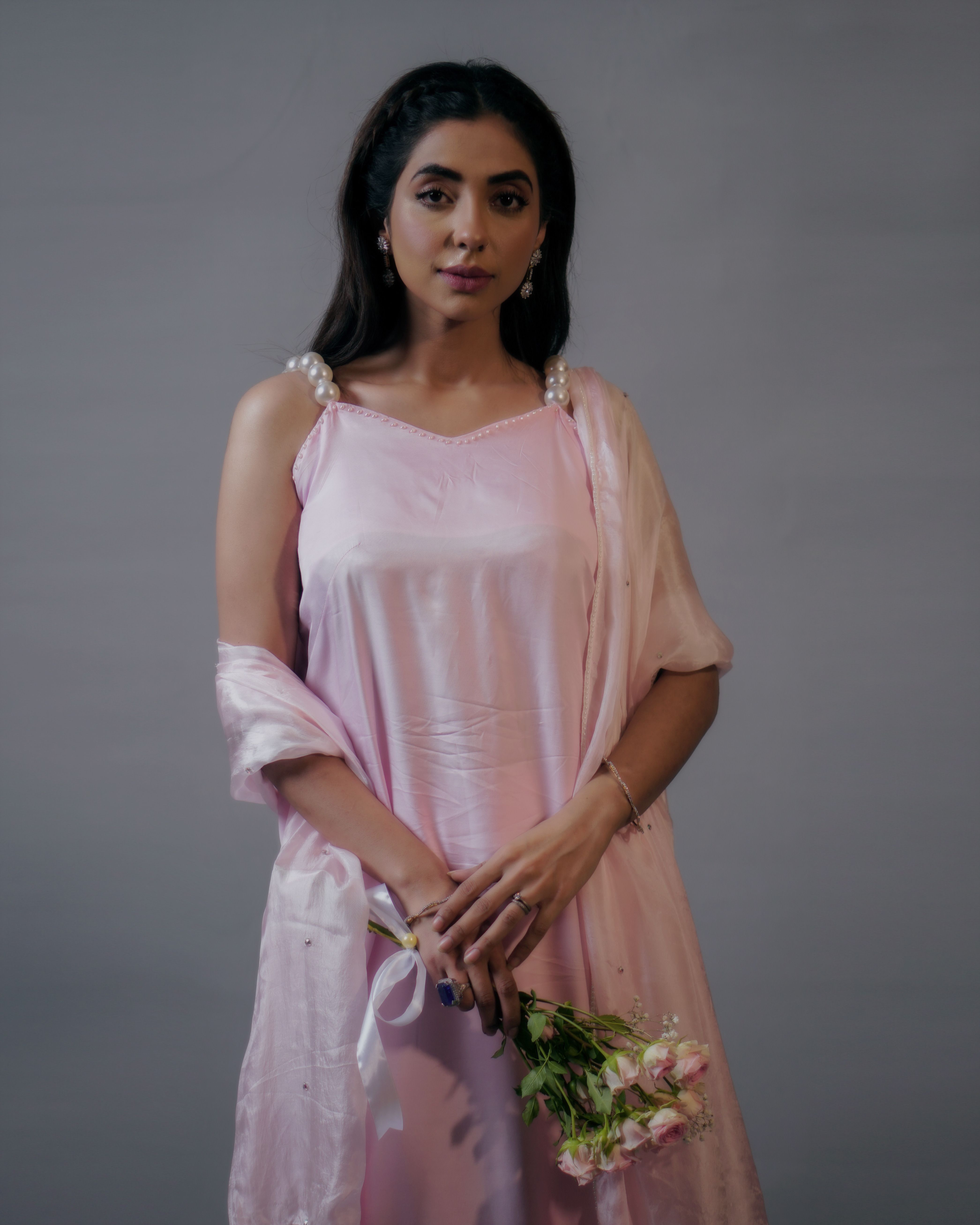 Woman in Pink Dress Holding Flowers · Free Stock Photo