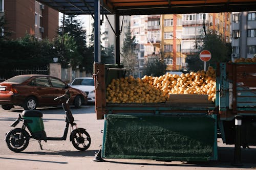 Market Stand with Fruits in a City Street 