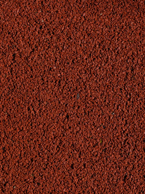 Fotos de stock gratuitas de asfalto rojo, áspero, de cerca