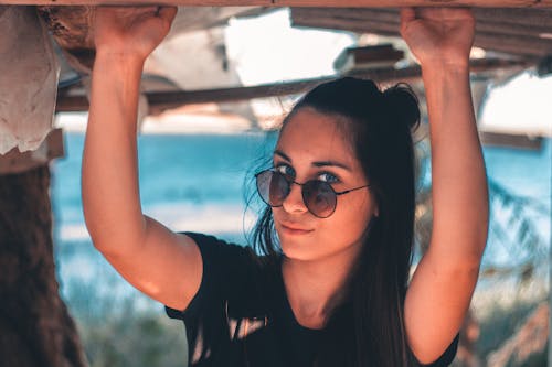 Photo of a Woman Wearing Sunglasses