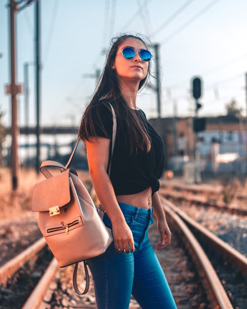 Free Woman Carrying Backpack Stock Photo