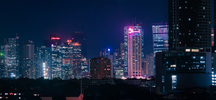 Dynamic cityscape with neon-lit skyscrapers at night, capturing urban energy and vibrant city life.