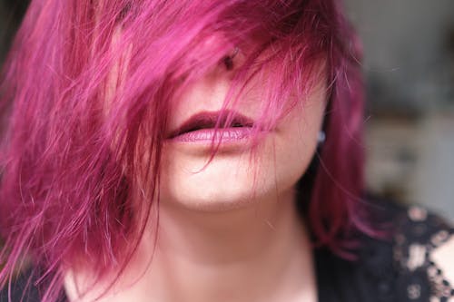 Close Up Photography of Woman with Pink Hair