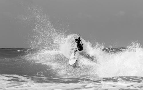 Free Grayscale Photography of Surfer Stock Photo