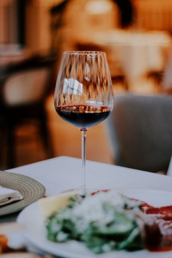 Glass of red wine on restaurant table