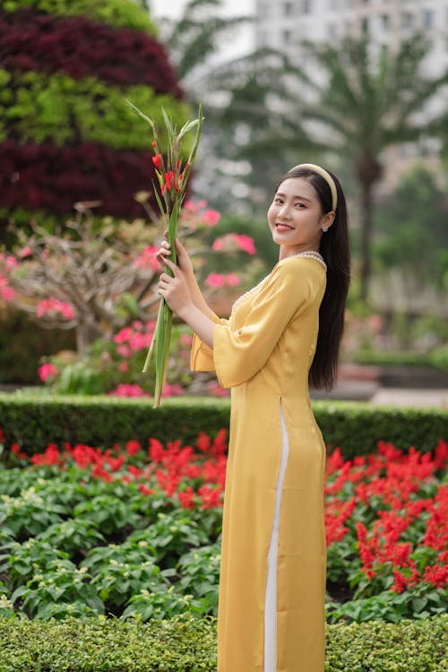 Smiling Woman in Yellow Dress