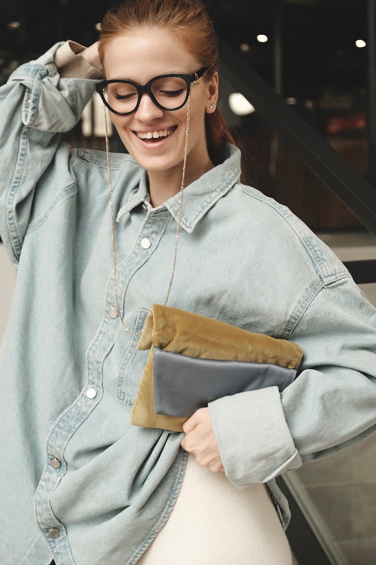 Smiling Young Woman In Stylish Glasses