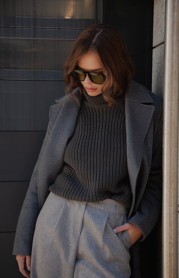 Stylish Woman In Sunglasses And Outerwear