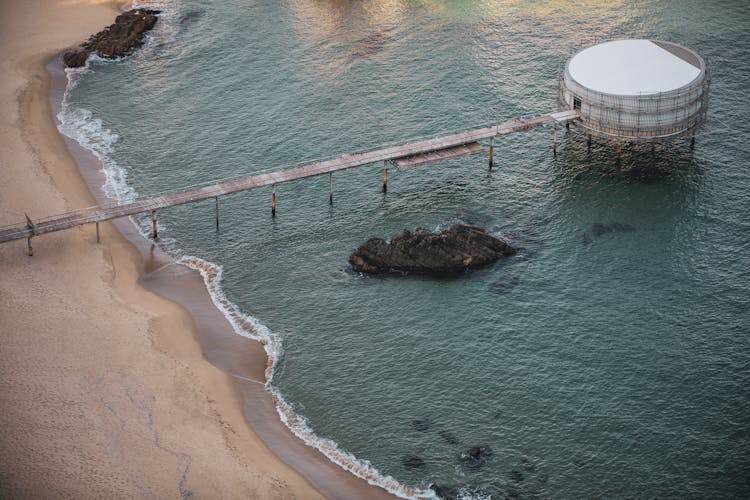 Fuel Reservoir In Water Near Seashore