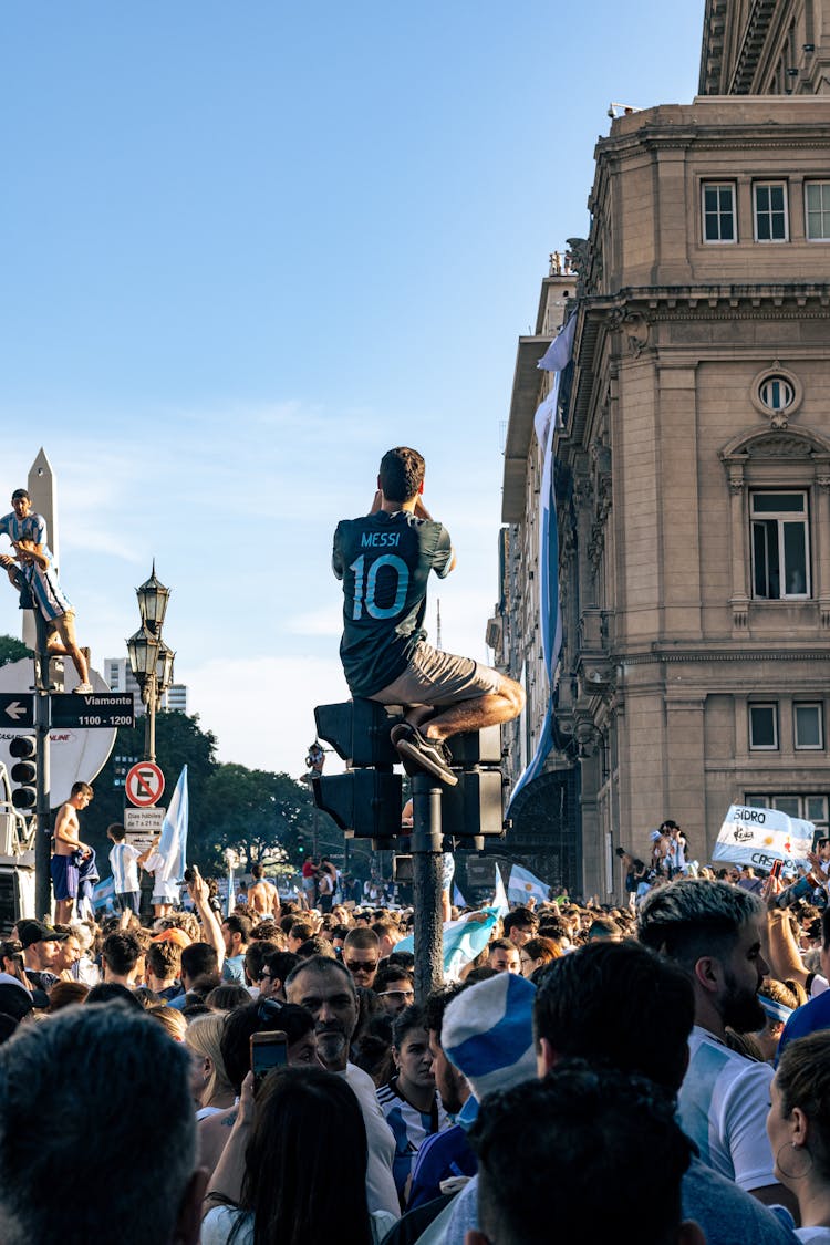 Man In Messi Jersey Celebrating Winning FIFA World Cup 2022 On Street Of Buenos Aires, Argentina