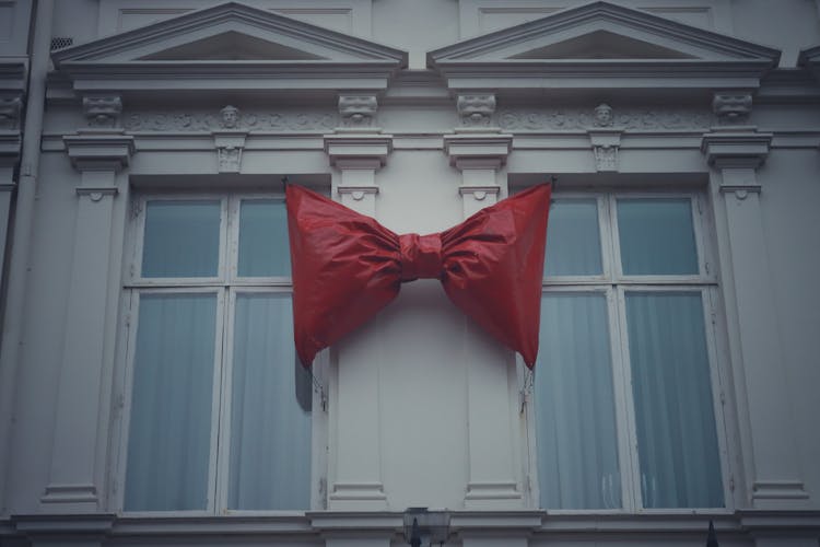 Red Bow Tie On A Wall 