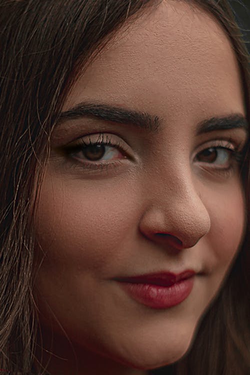 Woman Wearing Makeup in Close Up Photography