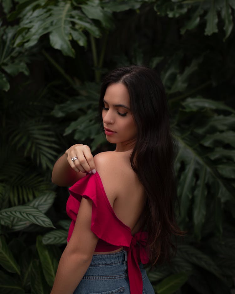 Woman Adjusting Her Shoulder Strap 