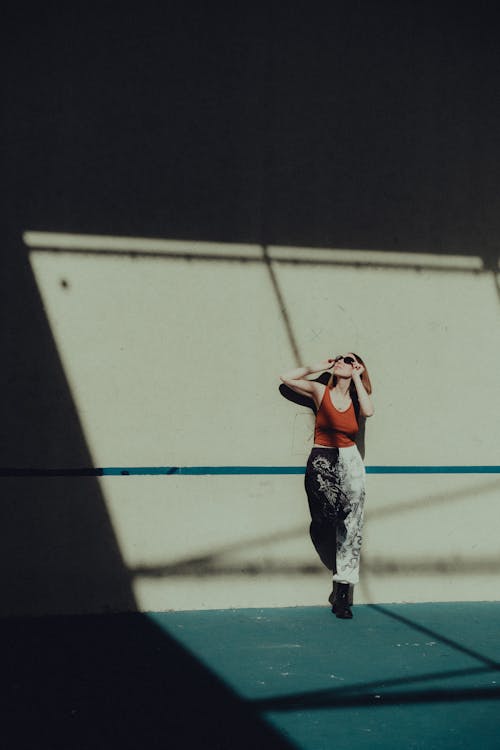 Woman Posing in Pants with Print