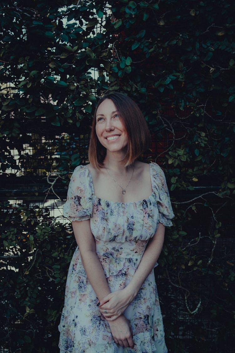 Woman In Summer Dress Beaming