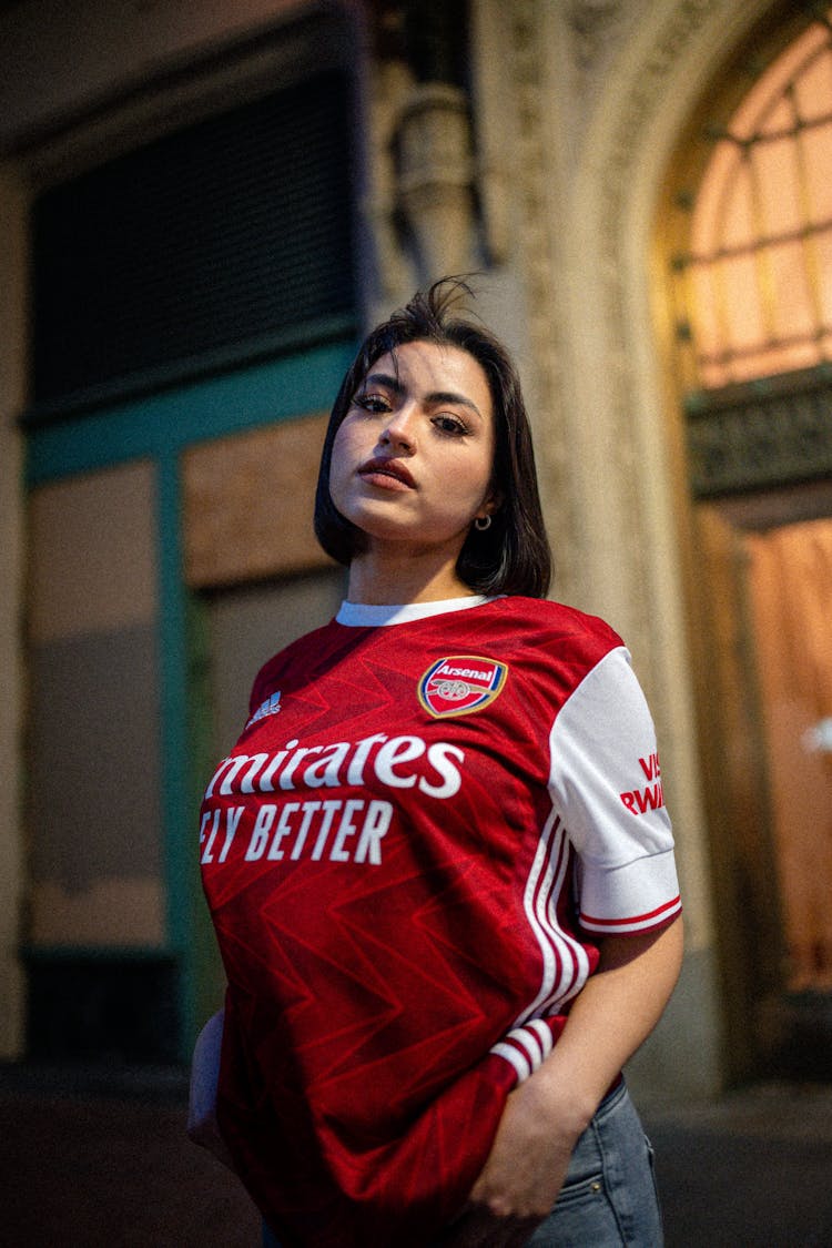 A Woman Wearing Red Jersey