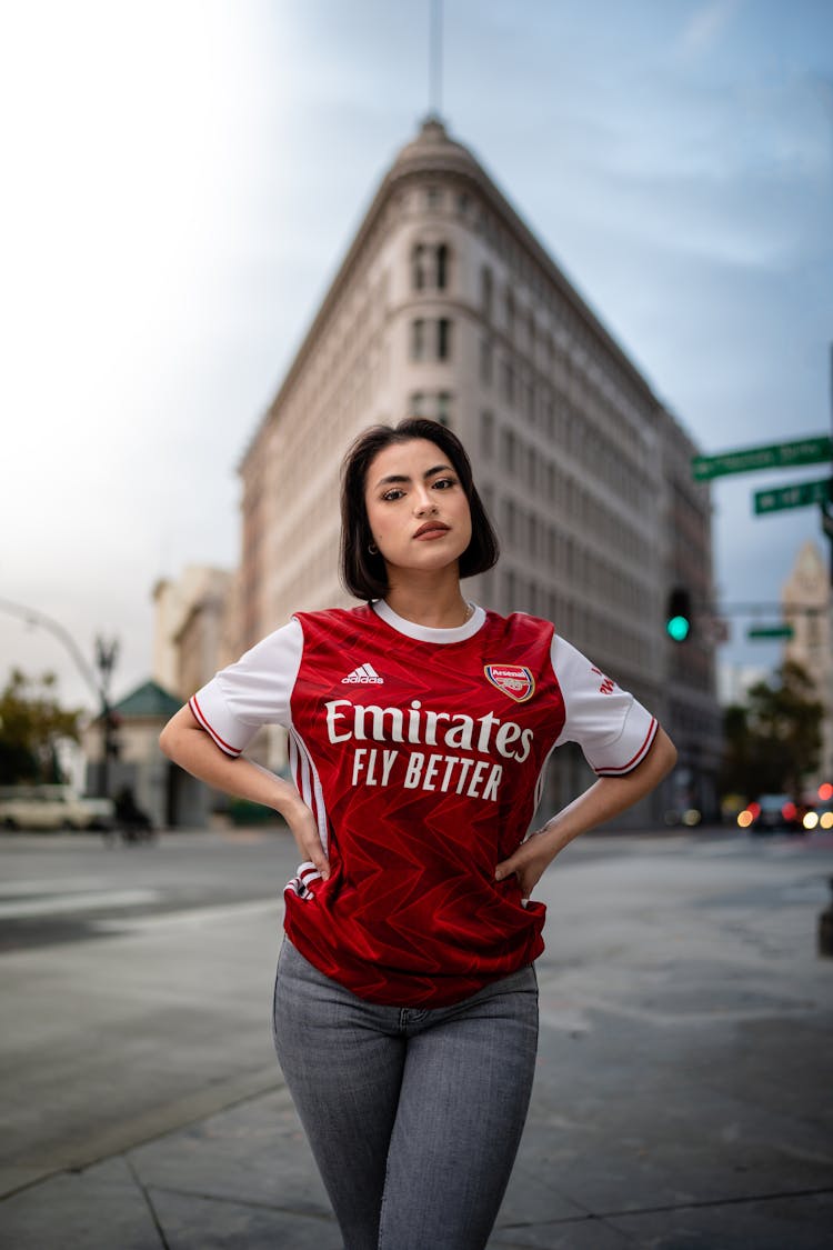 Woman Posing On The Street Among Building