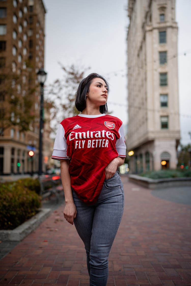 Woman Posing On The Street In Emirates T-shirt