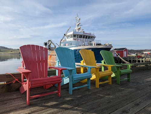 Colorful Chairs on a Pier 