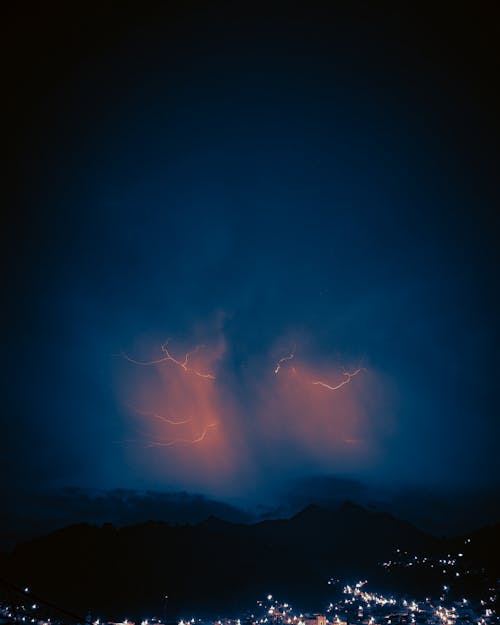 Red Lightning over Landscape