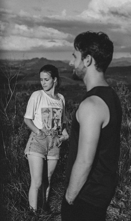 Couple Standing in Meadow