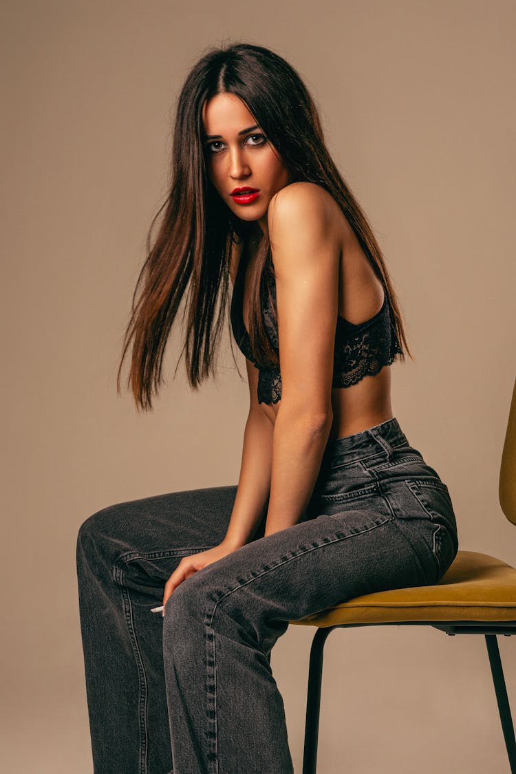 Woman Posing On Chair