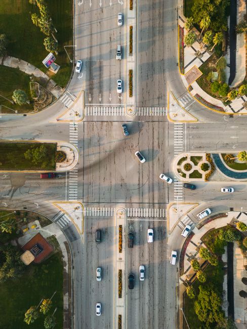 Drone shot of a busy city intersection in Al Jubail, Saudi Arabia, showcasing urban infrastructure.