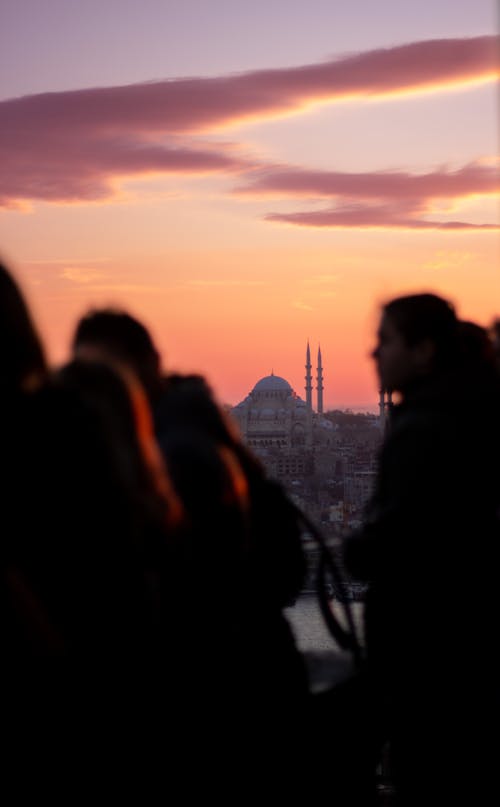 Group of Tourists at the Viewpoint Overlooking the Suleymaniye Mosque at Dusk