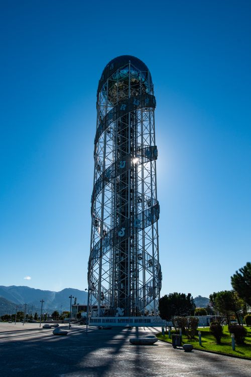 Free Low angle view of the Alphabetic Tower against a clear blue sky in Batumi, Georgia. Stock Photo