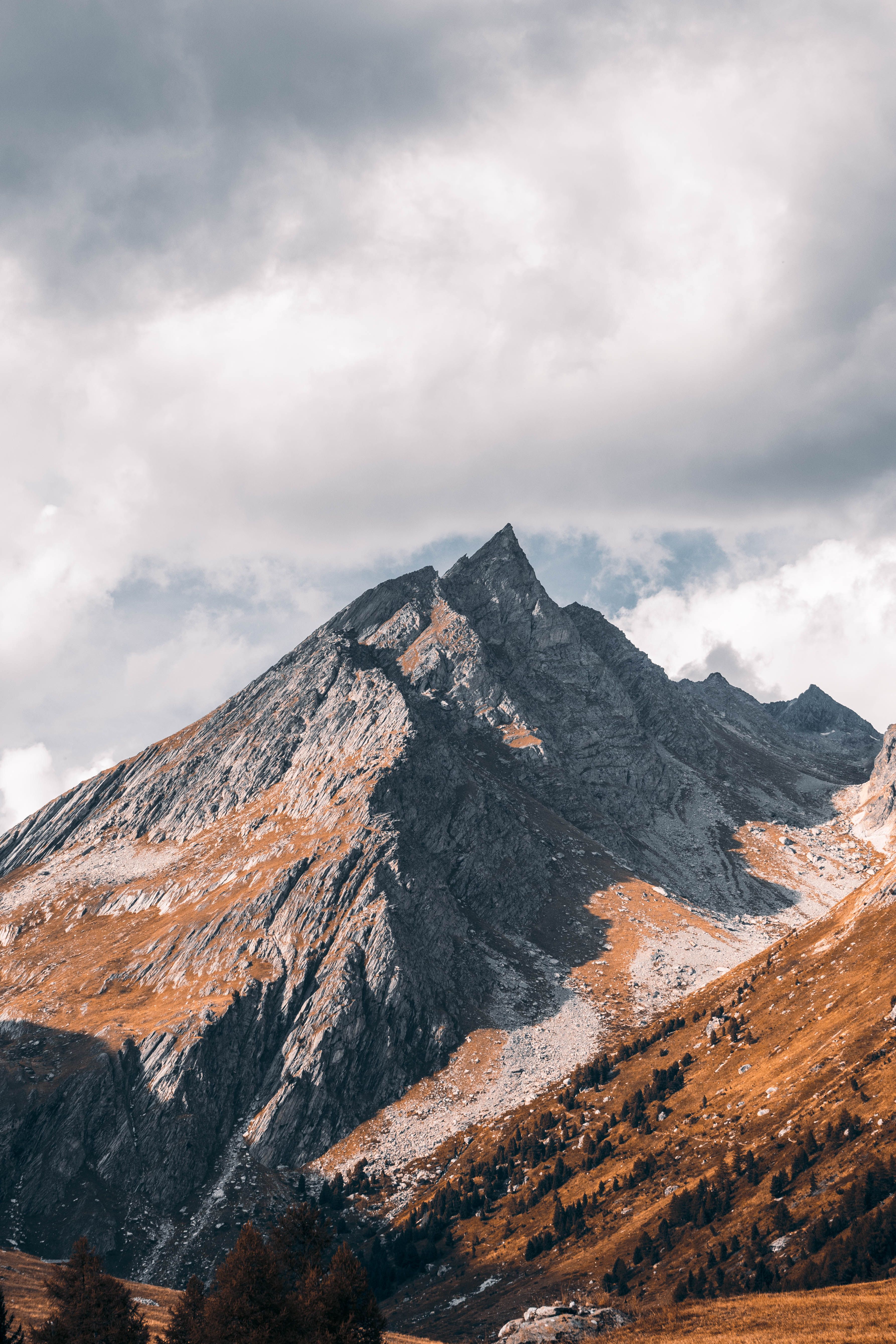 free-photo-of-clouds-over-rocky-mountain.jpeg?auto=compress\u0026cs=tinysrgb\u0026w=1600