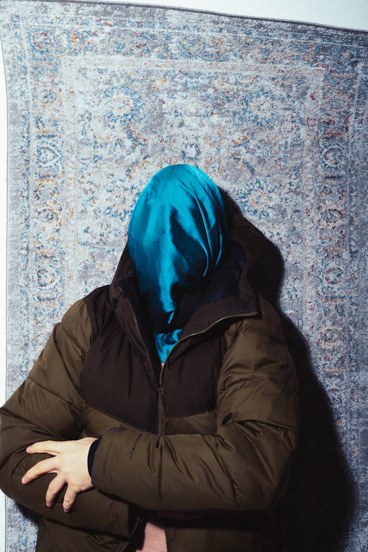 Person Covering Face